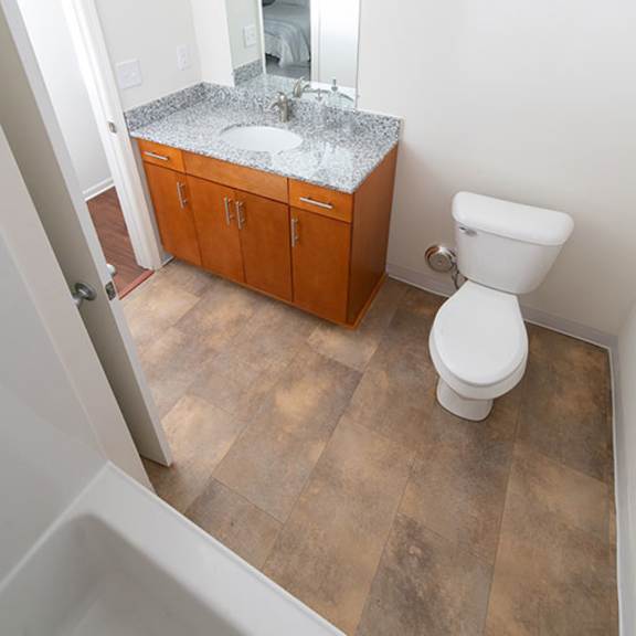 bathroom with vanity lights at gray estates apartments, mrd conventional, st clair mi 48079