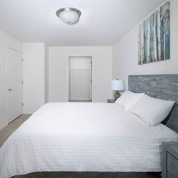 contemporary bedroom with closet  at gray estates apartments, mrd conventional, st clair mi 48079