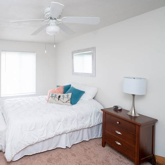 bedroom with expansive windows at kuder estates apartments, mrd conventional, warsaw, in
