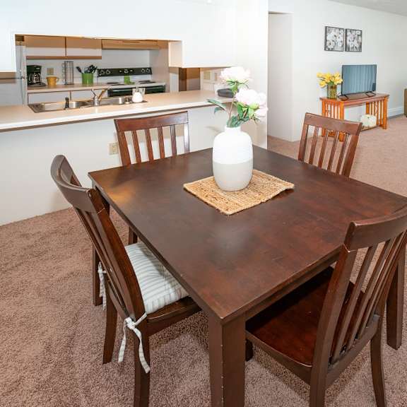 living room with dining area at kuder estates apartments, mrd conventional, warsaw, in