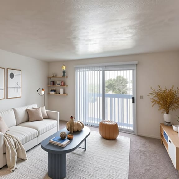 a living room with a white couch and a coffee table.