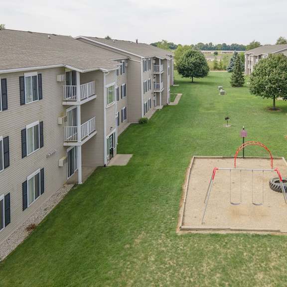 play area exterior at nelson estates apartments,1815 raleigh ave, kendallville, in 46755