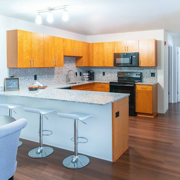 fully equipped kitchen at oliver apartments, temperance, mi