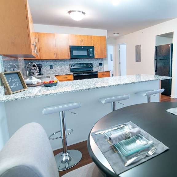 dining and kitchen at oliver apartments, michigan