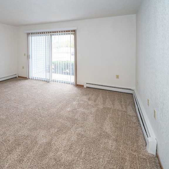 living room crawford apartments, 8640 independence ave, port austin, mi 48467