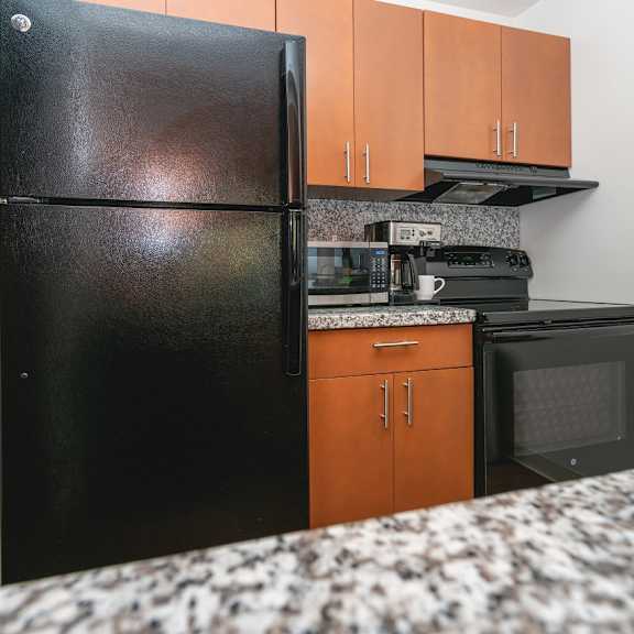 granite counter tops in kitchen at raleigh house apartments, mrd apartments, michigan