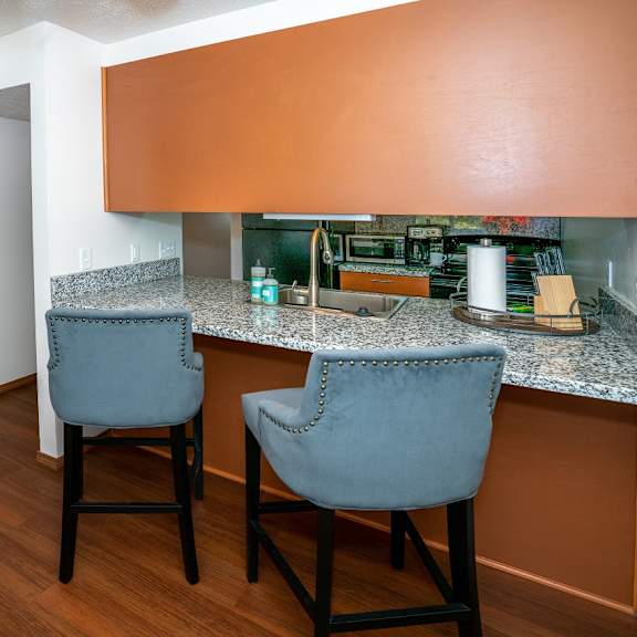 gourmet kitchen with island at raleigh house apartments, mrd apartments, east lansing, mi