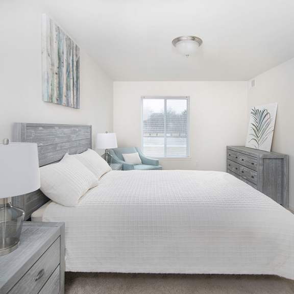beautiful bright bedroom with wide windows at gray estates apartments, mrd conventional, st clair mi 48079