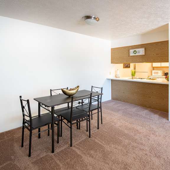 dining and kitchen at woodbury estates apartments, adrian, michigan