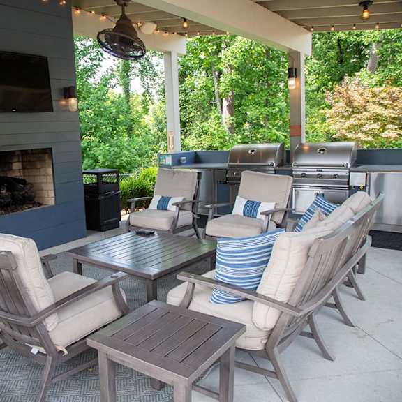 woodstock west by walton apartment homes  outdoor fireplace and grills at woodstock west by walton, woodstock, georgia