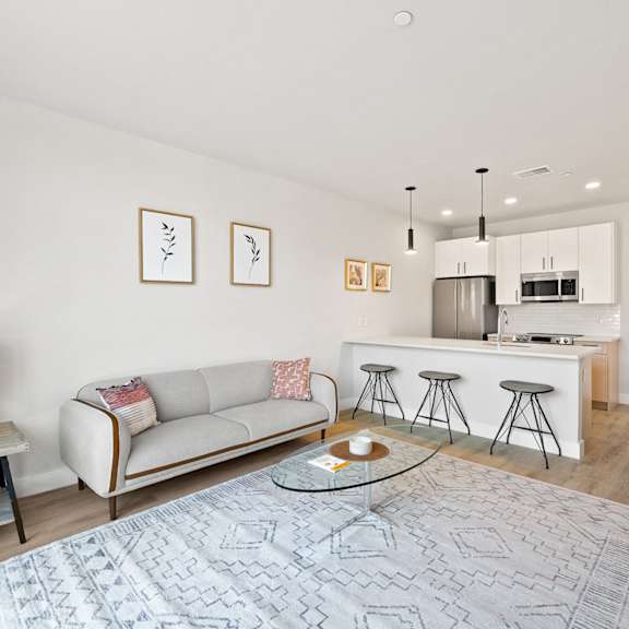 a living room with a couch and a table