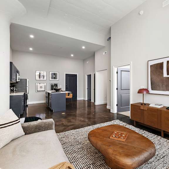 a living room with a couch and a coffee table