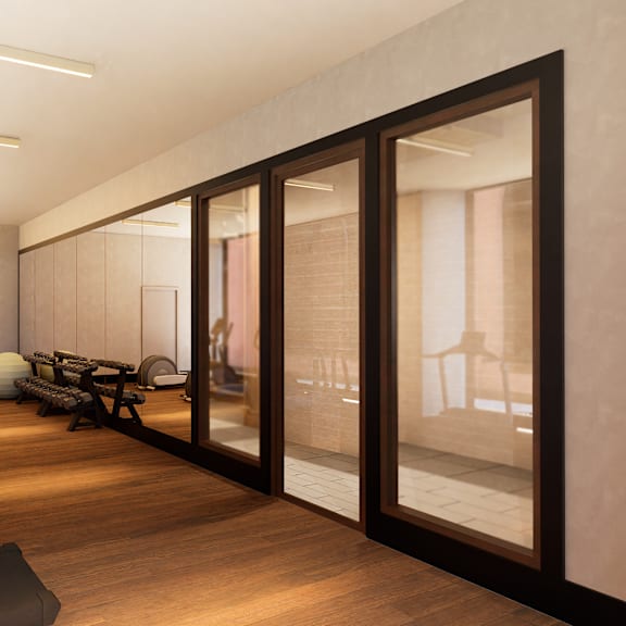 a modern home gym with a variety of equipment.