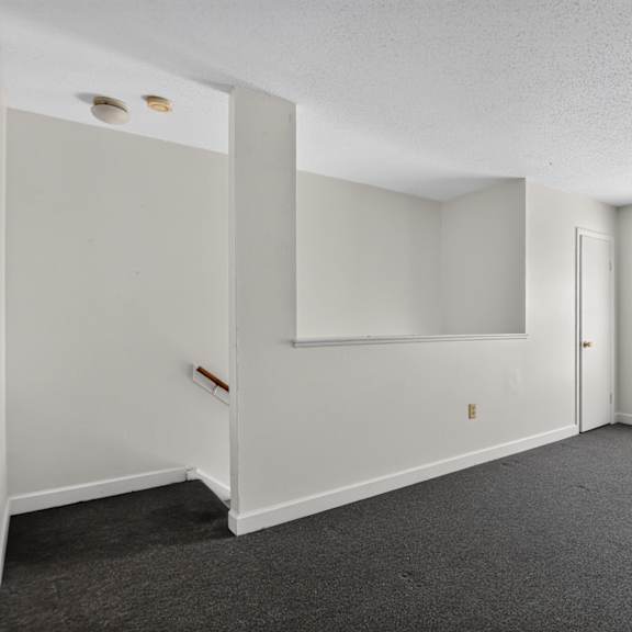 a room with a window and a door.