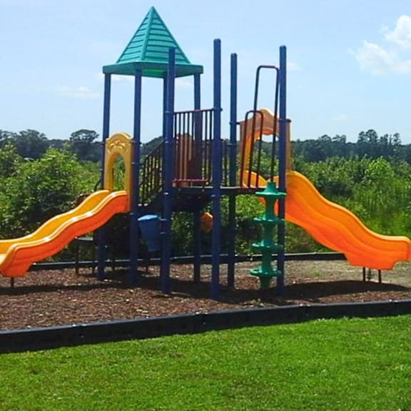 a playground with slides on a