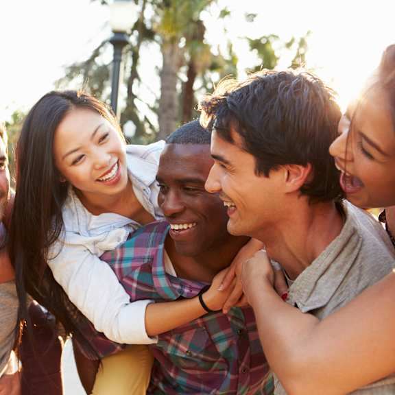 a group of friends posing for a picture together