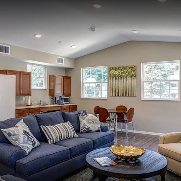 a living room with a couch and a table