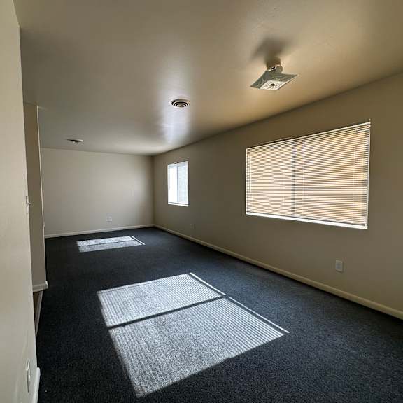 living room in one bedroom apartment at west road apartments