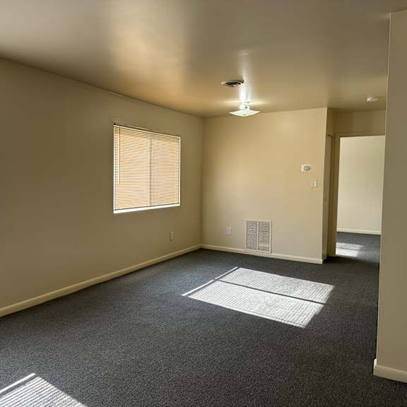 living and dining area in one bedroom apartment