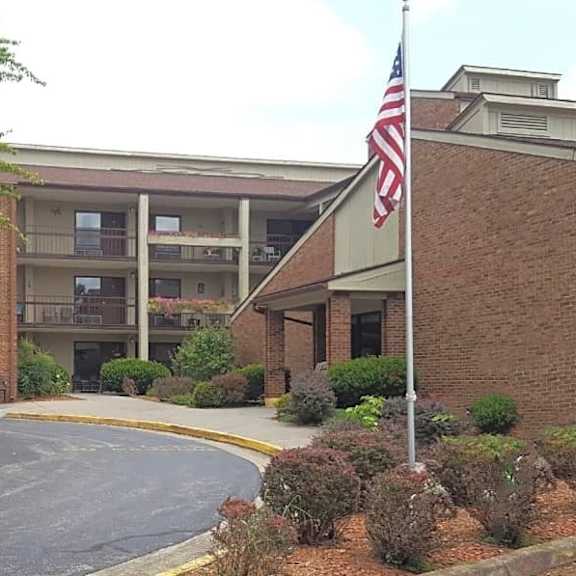a building with an american flag in front of it