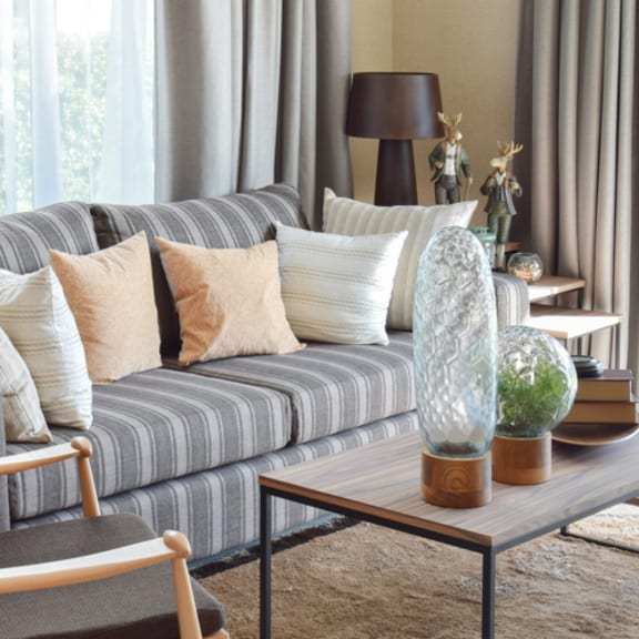 a living room with a couch and a coffee table