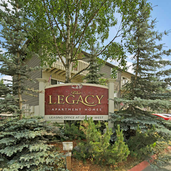 the legacy apartments - sign