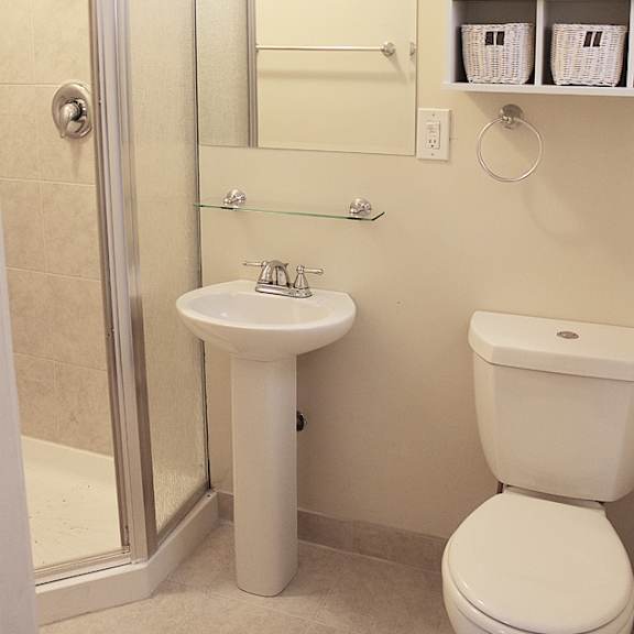 renovated bath with shower at integrity cleveland heights apartments, cleveland heights