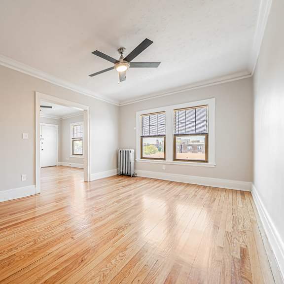 dining room with hardwood floors and a ceiling fan. at integrity gold coast apartments, ohio