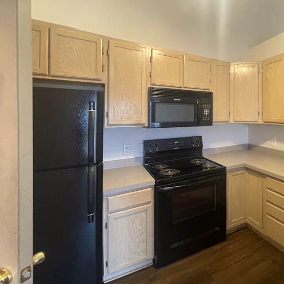kitchen with black appliance package