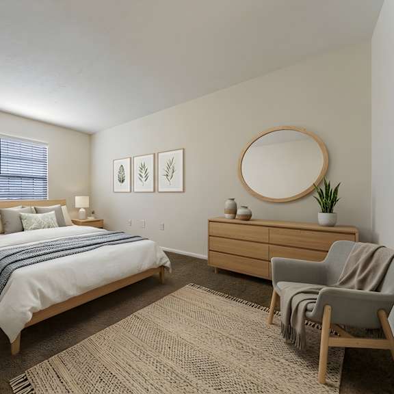 a bedroom with a bed, nightstand, chair, and a plant. at hunt club apartments, apartments, copley, oh