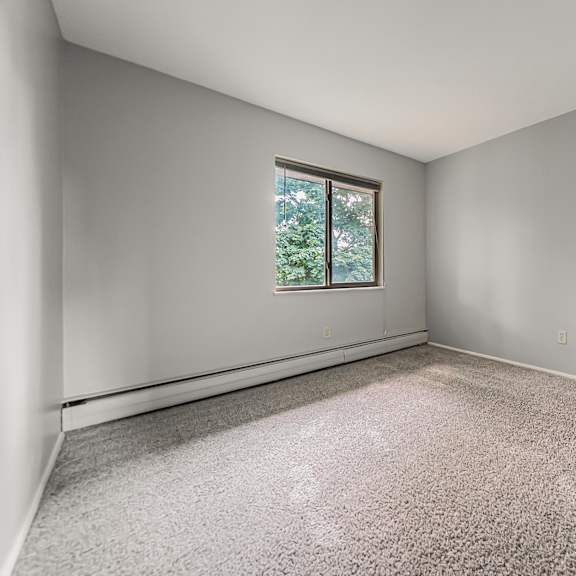 a room with a window and carpeted floor. at integrity berea apartments, berea, ohio