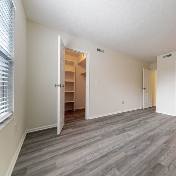a room with a grey floor and white walls at hunt club apartments, ohio, 44321