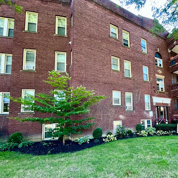 a red brick building with a tree in front at integrity cleveland heights apartments, cleveland heights, 44106
