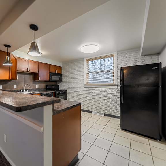 functional kitchen at river run apartments, warren