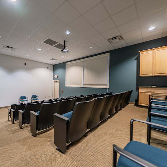presentation room at river run apartments, warren
