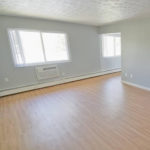 a room with wooden floors and white walls. at integrity berea apartments, apartments, berea, oh
