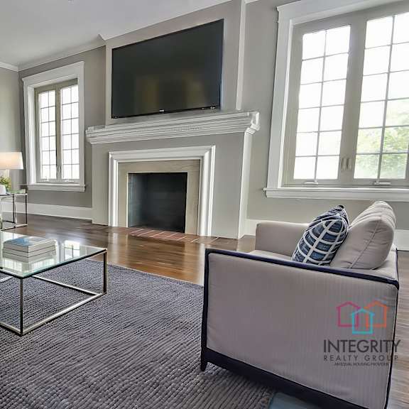 example of a furnished living room. at integrity gold coast apartments, cleveland, oh, 44102