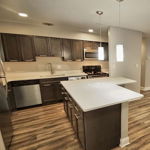 wood inspired plank flooring at old green place apartments, integrity realty llc, beachwood, oh, 44122