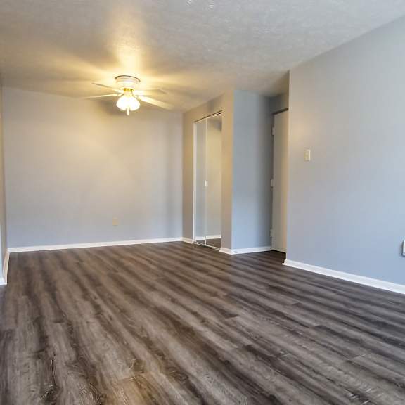 a room with wooden flooring and a light on the ceiling. at integrity berea apartments, berea, ohio