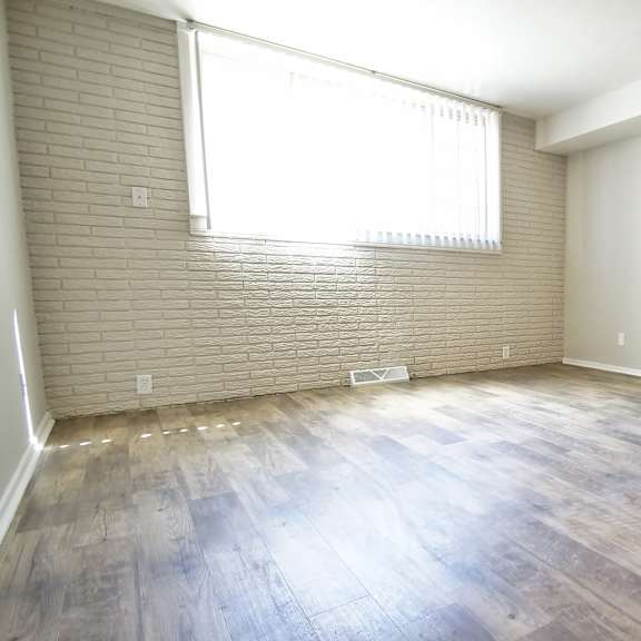 wood inspired plank flooring at river run apartments, warren, 44485