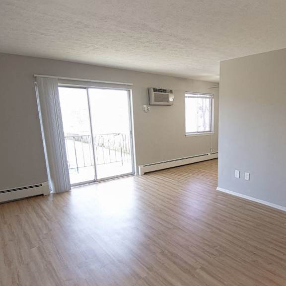 updated living area with plank flooring