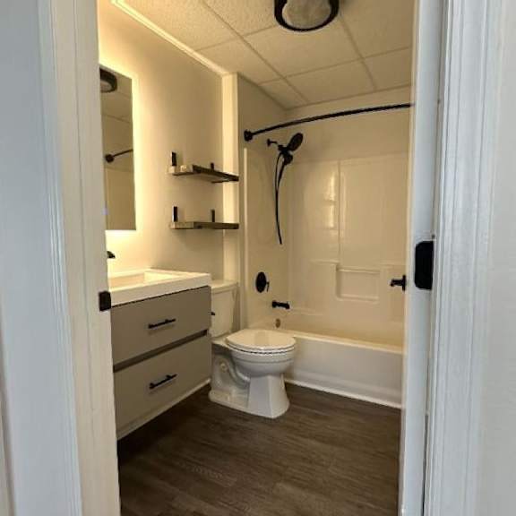 a bathroom with a toilet sink and bathtub