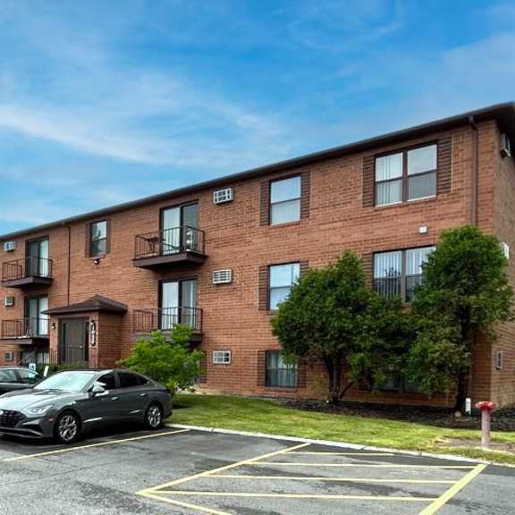 apartment exterior and parking area.