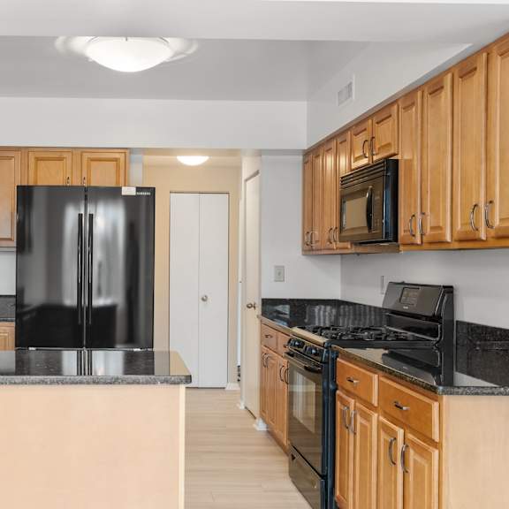 kitchen with maple cabinets at atrium in the village, beachwood, oh