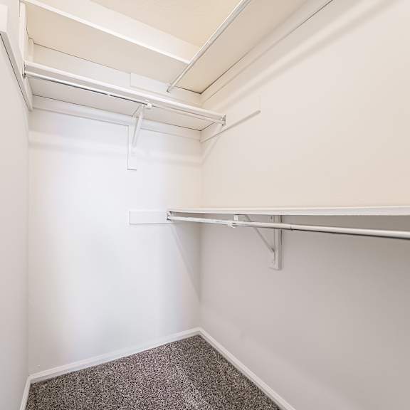 spacious walk-closet with shelving at hunt club apartments, copley, 44321