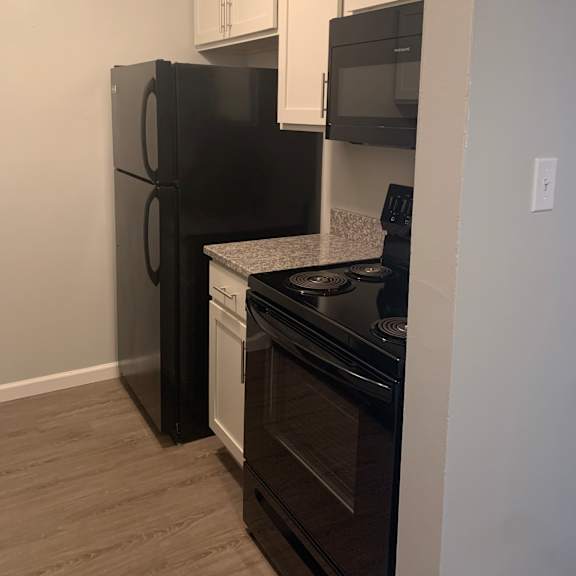 renovated kitchen with granite at ryan place apartments, integrity realty, ohio, 44240