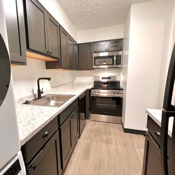 modern kitchen at renova of brunswick apartments, ohio, 44212
