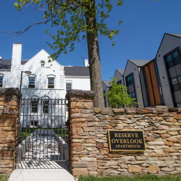 reserve overlook apartments view of walking entry and sign