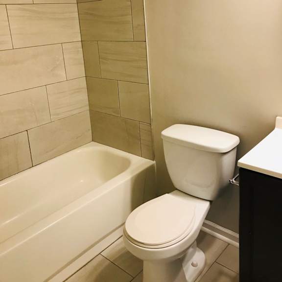 updated guest bathroom with tub