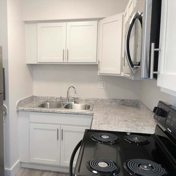 left side of renovated kitchen at eagles landing apartments, integrity realty, kent, oh